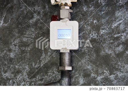 the gas meter is installed on a pipe in the kitchen the gas meter is installed on a pipe in the kitchen 70863717