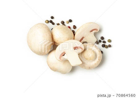 Raw mushrooms and peppercorns isolated on white background 70864560
