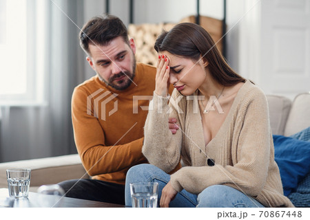 Upset couple is having quarrel at home. Family problems concept. Upset couple is having quarrel at home. Family problems concept. 70867448