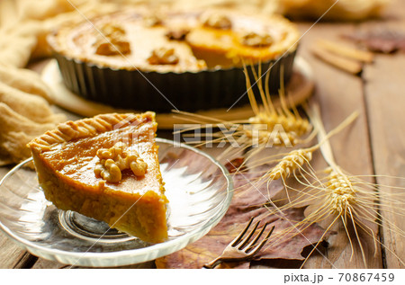 Fresh Homemade Pumpkin Pie on rustic wooden background made for Thanksgiving or halloween. 70867459