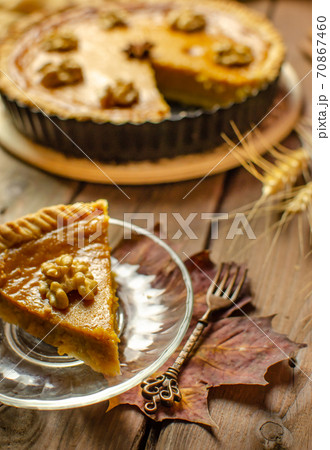 Fresh Homemade Pumpkin Pie on rustic wooden background made for Thanksgiving or halloween. 70867460