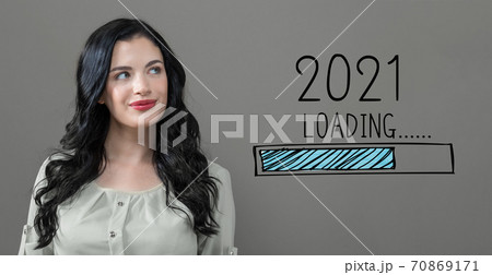 Loading new year 2021 with young woman 70869171