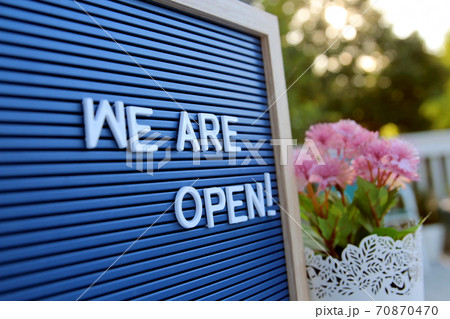 Welcome sign at the store/bar/restaurant. We are open 70870470