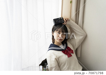 カメラと女子高生の写真素材