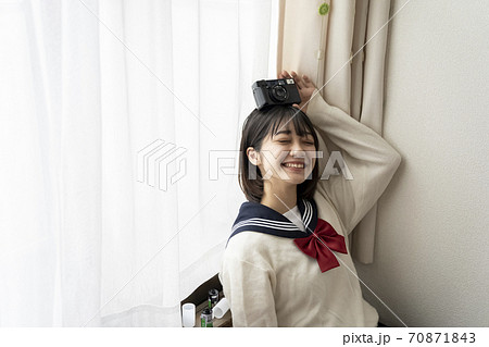 カメラと女子高生の写真素材