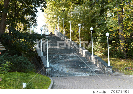 Stone staircase connecting two levels in the park. 70875405