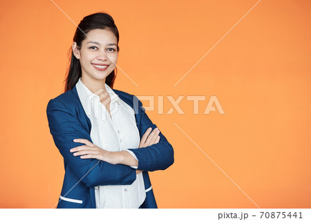 Smiling pretty female entrepreneur Smiling pretty female entrepreneur 70875441