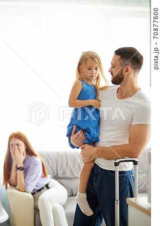 redhead woman is cryng after quarrel with husband redhead woman is cryng after quarrel with husband 70877600