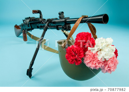 Machine Gun And Flowers 70877982