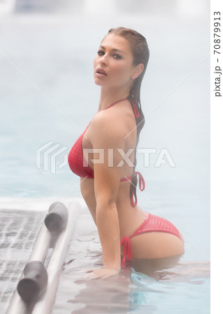Sexy woman in hot pool Sexy woman in hot pool 70879913