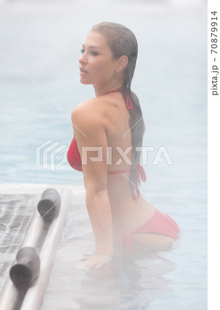 Sexy woman in hot pool Sexy woman in hot pool 70879914