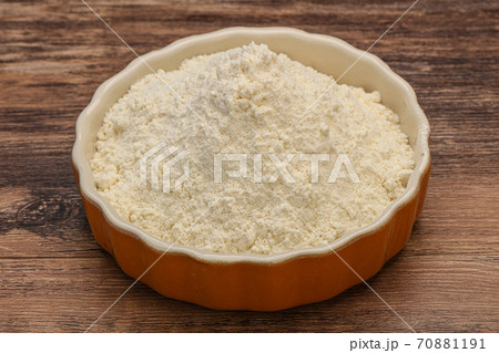 Wheat flour heap in the bowl Wheat flour heap in the bowl 70881191