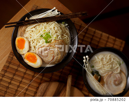 Tonkotsu ramen with pork bone based soup, traditional Japan noodle Tonkotsu ramen with pork bone based soup, traditional Japan noodle 70885202