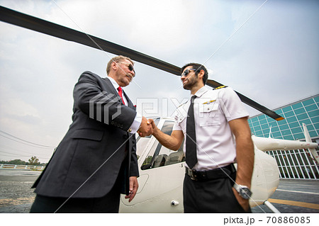 Business people traveling by helicopter , Shot of 70886085