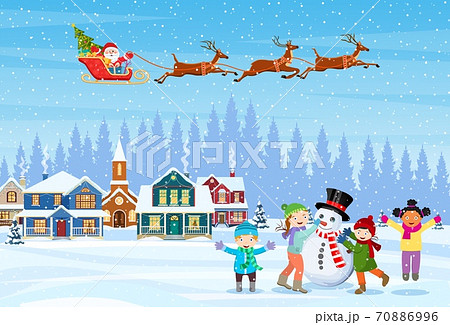 Children building snowman 70886996