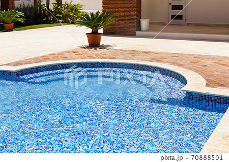 Empty swimming pool at sunny day. 70888501