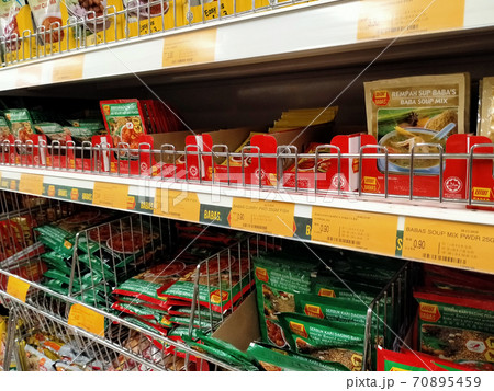 SEREMBAN, MALAYSIA -APRIL 2, 2020: The spices are sold in commercial packages and are displayed on shelves in the supermarket. Sort by brand and type to make it easier for customers to buy. SEREMBAN, MALAYSIA -APRIL 2, 2020: The spices are sold in commercial packages and are displayed on shelves in the supermarket. Sort by brand and type to make it easier for customers to buy. 70895459