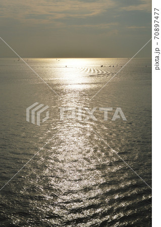 Sea by sunny day. 70897477