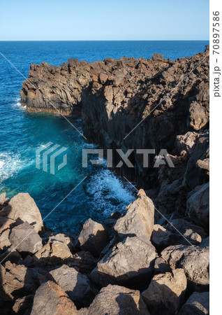 Volcanic coastline landscape. Rocks and lava formations in El Hierro, Canary islands, Spain. 70897586