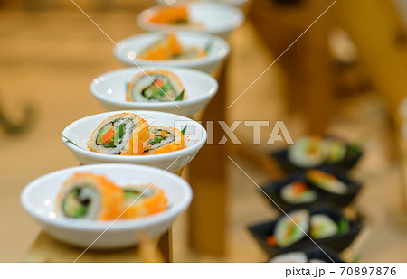 Assortment of sushi. appetizers in cocktail party. 70897876