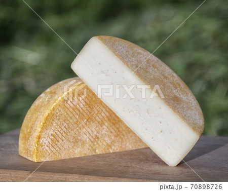 Craft cheese from cows and goats milk. Cheese head 70898726