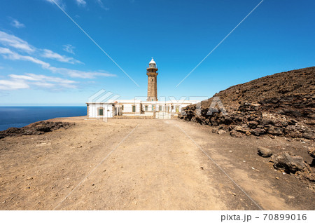Beautiful view of famous El Faro de Punta Orchilla lighthouse with red volcanic scenery and wide 70899016