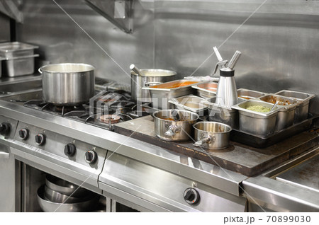 Stainless steel restaurant professional kitchen equipment and work surface. Stainless steel restaurant professional kitchen equipment and work surface. 70899030
