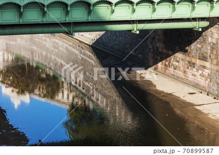 green iron bridge over river green iron bridge over river 70899587