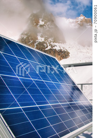 Solar panel in mountain lake on blue sky background. Alternative energy concept 70900061