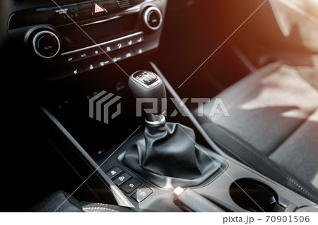 MURES, ROMANIA - OCTOBER 21, 2020, interior view. Manual transmission gear of new car. MURES, ROMANIA - OCTOBER 21, 2020, interior view. Manual transmission gear of new car. 70901506