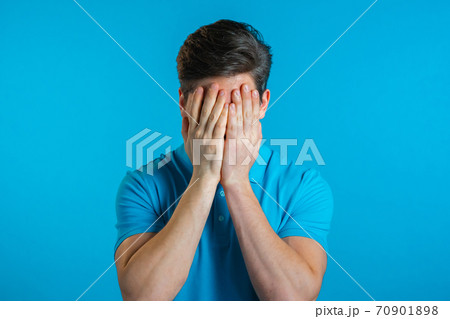 Portrait of young man doing facepalm gesture, like no, I forgot. Unhappy guy feeling sorrow, regret Portrait of young man doing facepalm gesture, like no, I forgot. Unhappy guy feeling sorrow, regret 70901898