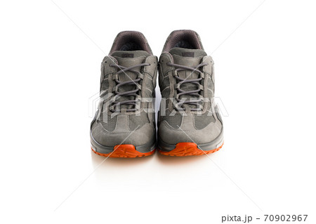 trekking sneakers with red sole, isolated on white trekking sneakers with red sole, isolated on white 70902967