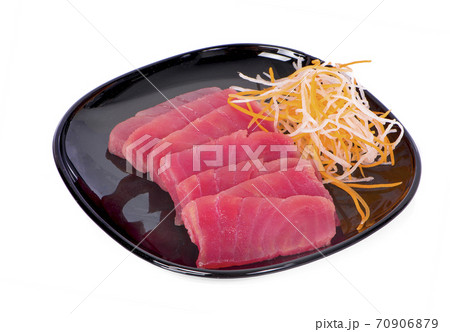Raw tuna fish isolated on white background. Raw tuna fish isolated on white background. 70906879