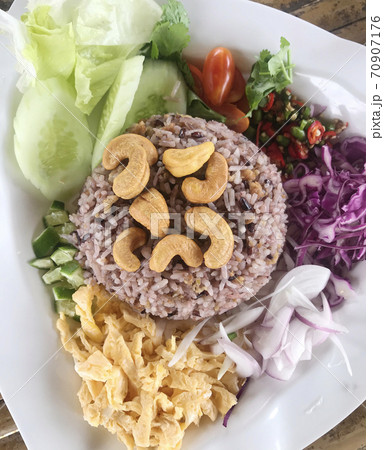Fried rice with salted fish and chinese kale with vegetables Fried rice with salted fish and chinese kale with vegetables 70907176