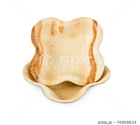 Cup made from dried betel nut leaf palm, isolated. The Green product eco friendly concept. Cup made from dried betel nut leaf palm, isolated. The Green product eco friendly concept. 70908634