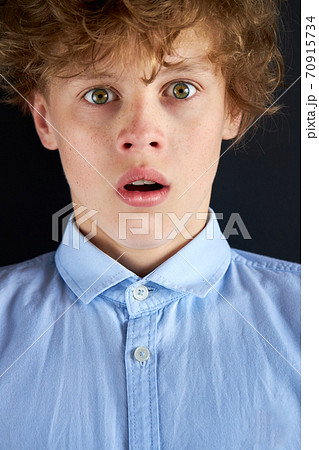 close-up portrait of surprised caucasian boy 70915734