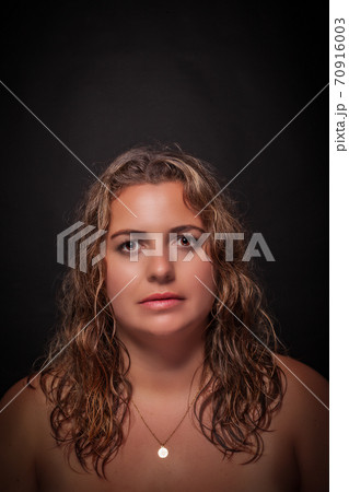 Portrait of an overweight, naked beauty. 70916003