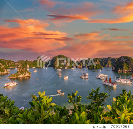 Halong Bay composition with orange sky and clouds, Vietnam Halong Bay composition with orange sky and clouds, Vietnam 70917068