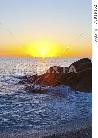 Sunset on the rocky shore. Sunset on the rocky shore. 70919102