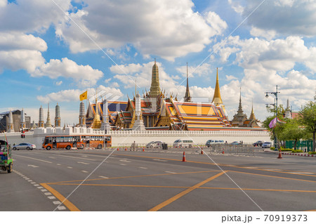 Golden pagoda at Temple of the Emerald Buddha in Bangkok, Thailand. Wat Phra Kaew and Grand palace in old town, urban city. Buddhist temple, Thai architecture. A tourist attraction 70919373