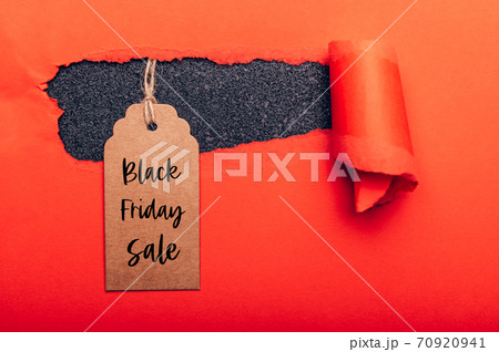 Words Black Friday Sale written on tag 70920941