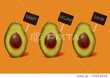 avocado fruits and text happy vegan day 70924859