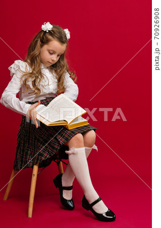 Schoolgirl in uniform 70926908
