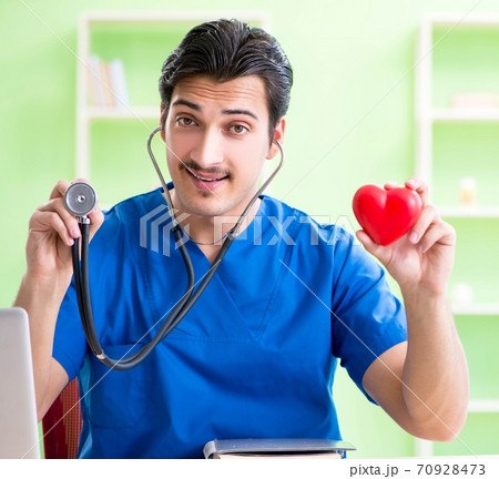 Young doctor working in the hospital 70928473