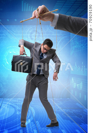 Businessman puppet being manipulated by boss 70929190