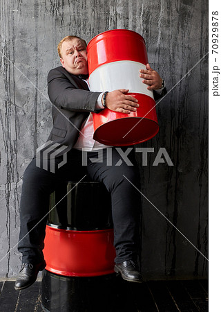 greedy fat oil tycoon hugs barrel 70929878