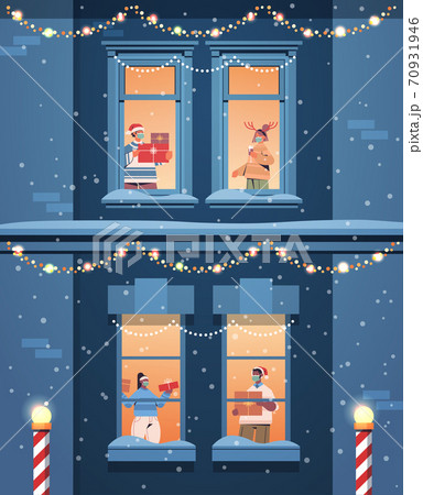 people in santa hats holding gifts mix race neighbors standing in window frames new year christmas holidays 70931946