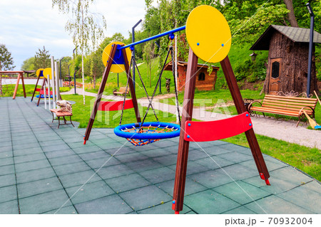 Empty colorful children's playground in a city park Empty colorful children's playground in a city park 70932004