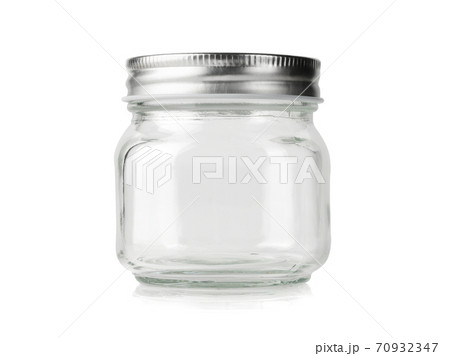 Empty mason jar with silver lid isolated on white. Empty mason jar with silver lid isolated on white. 70932347