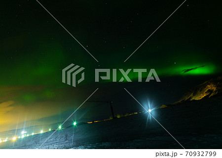 Northern lights in the night sky of iceland. Soft focus. Magical green glow. 70932799